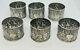 6 Antique Chinese Sterling Silver Hand Chased Figures Scenic Napkin Rings