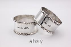 A cased pair of Walker & Hall Sterling Silver napkin Rings 1948