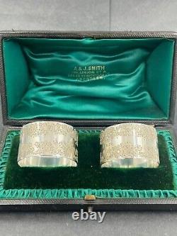 A nice pair of hand engraved sterling silver napkin rings in fitted case 1898/08