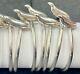 A Set Of 8 Modern Sterling Silver Napkin Rings With Seals 925