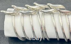 A set of 8 modern sterling silver napkin rings with seals 925