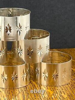 A set of six modernist star burst sterling silver napkin rings Birmingham 1971