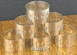 A set of six modernist star burst sterling silver napkin rings Birmingham 1971