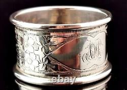 Antique sterling silver napkin ring, Floral engraved