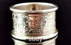 Antique sterling silver napkin ring, Floral engraved