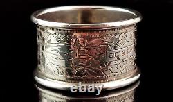 Antique sterling silver napkin ring, Floral engraved