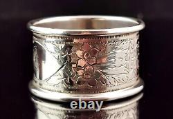 Antique sterling silver napkin ring, Floral engraved