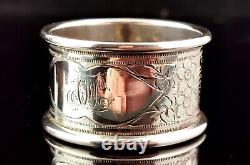 Antique sterling silver napkin ring, Floral engraved