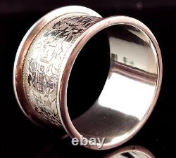 Antique sterling silver napkin ring, Floral engraved