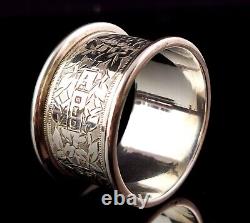 Antique sterling silver napkin ring, Floral engraved