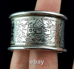 Antique sterling silver napkin ring, Floral engraved