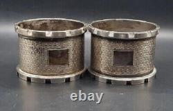 Pair Of 1959 English Sterling Silver Castle Edge Design Napkin Rings. John Rose