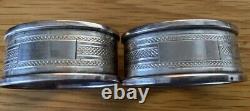 Pair of English Oval Sterling Silver Napkin Rings, blank cartouches, dated 1970