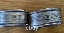 Pair of English Oval Sterling Silver Napkin Rings, blank cartouches, dated 1970