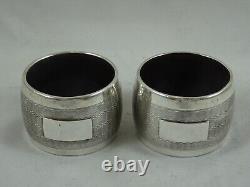Pair of Sterling Silver and Bakelite Napkin Rings, blank cartouches, dated 1952