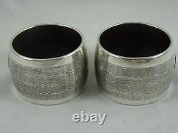 Pair of Sterling Silver and Bakelite Napkin Rings, blank cartouches, dated 1952