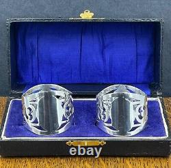 Pair of pierced sterling silver napkin rings in fitted case Birmingham 1919