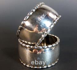 SUPERB PAIR of STERLING SILVER NAPKIN RINGS by GEORG JENSEN