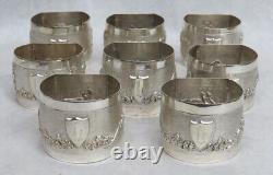 Set Of 8 Sterling Silver Figural High Relief Napkin Rings