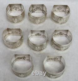 Set Of 8 Sterling Silver Figural High Relief Napkin Rings