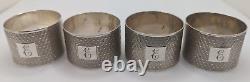 Set of 4 Cased Antique English Sterling Silver Napkin Rings E initial, d. 1936