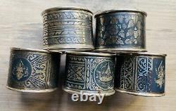 Attractive Antique Five Sterling silver Niello napkin rings, Thailand	<br/>
 
 <br/>
Les cinq jolis anneaux de serviette en argent sterling niellé, Thaïlande