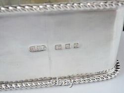 Paire d'anneaux de serviette en argent sterling avec pierres, John Charles Lowe, Londres 1933