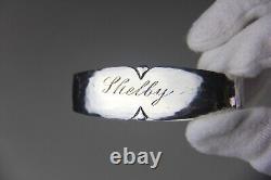 Paire d'anneaux de serviette en argent sterling martelé à la main de Randahl, monogrammés.