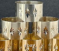 Un ensemble de six anneaux de serviette en argent sterling en forme d'étoile moderniste Birmingham 1971